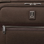 Close-up of a brown suitcase with zipper and travelpro logo