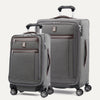 A set of two gray Platinum Elite spinner suitcases, one carry-on size and one medium check-in size, with chrome zippers and leather accents.