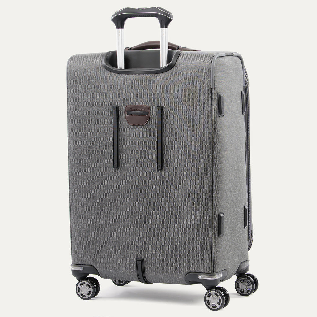 Gray suitcase with wheels on a white background