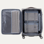Open grey suitcases with built-in organization pockets and adjustable straps.