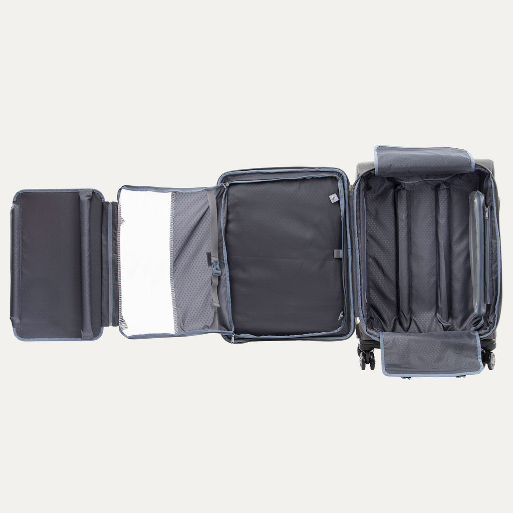 Open suitcase with compartments on a plain background