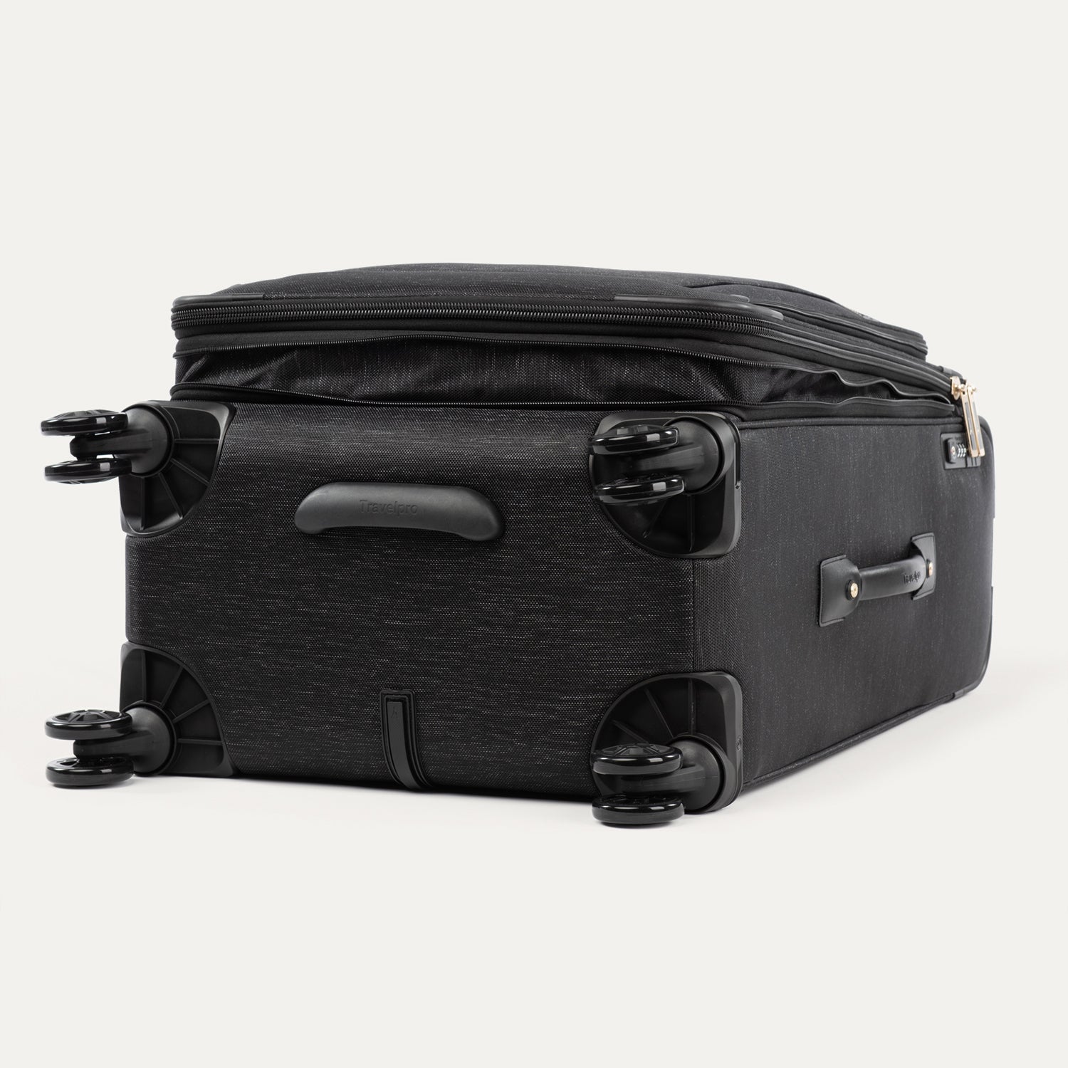 Black suitcase with black wheels on a white background