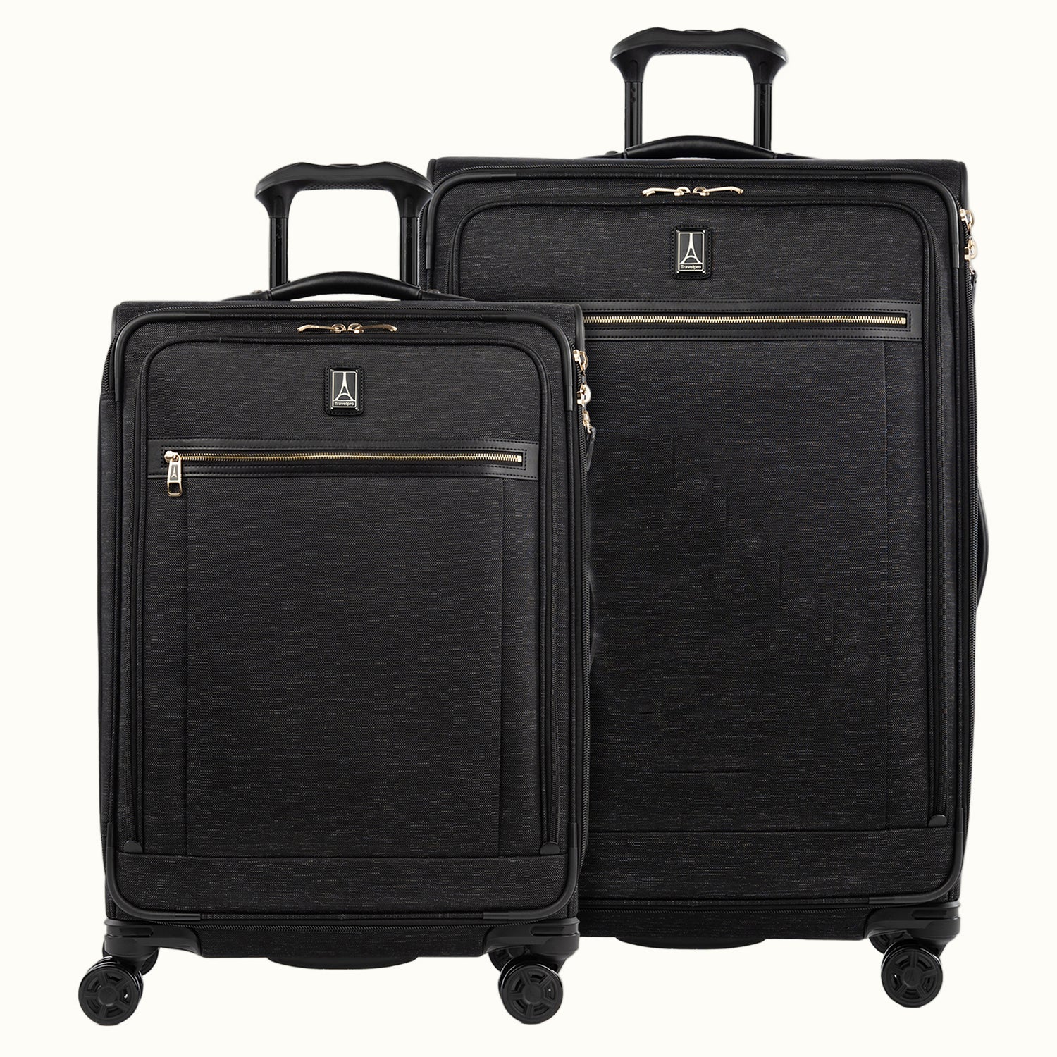 A set of two black suitcases with a spinner design, featuring the Travelpro logo on a white background