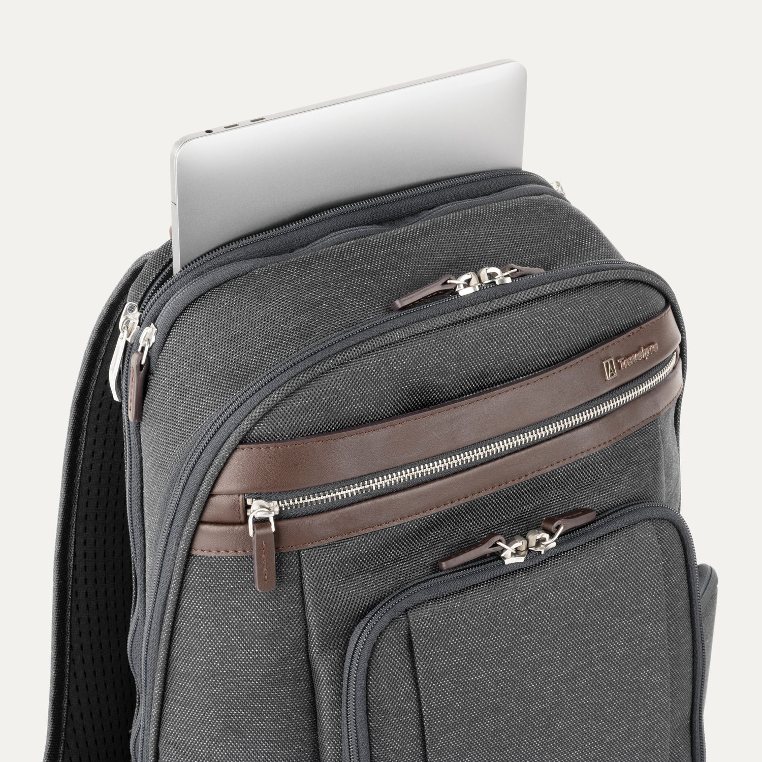 Vintage Gray backpack with laptop visibly stored in the dedicated sleeve compartment.
