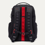 Rear view of the Travelpro Altitude Large Backpack in Crimson Shadow, showcasing the ergonomic padded shoulder straps, breathable airflow back panel, and integrated vertical luggage attachment strap for secure stacking.