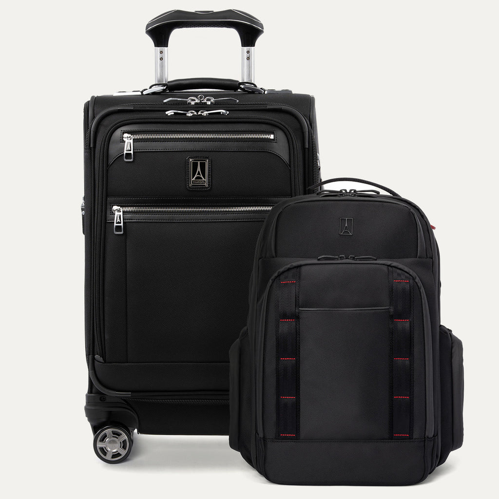 Front view of the Platinum Elite Carry-On Spinner in Shadow Black paired with the Travelpro Altitude Large Backpack in Crimson Shadow, displayed together to highlight the coordinated two-piece travel set.