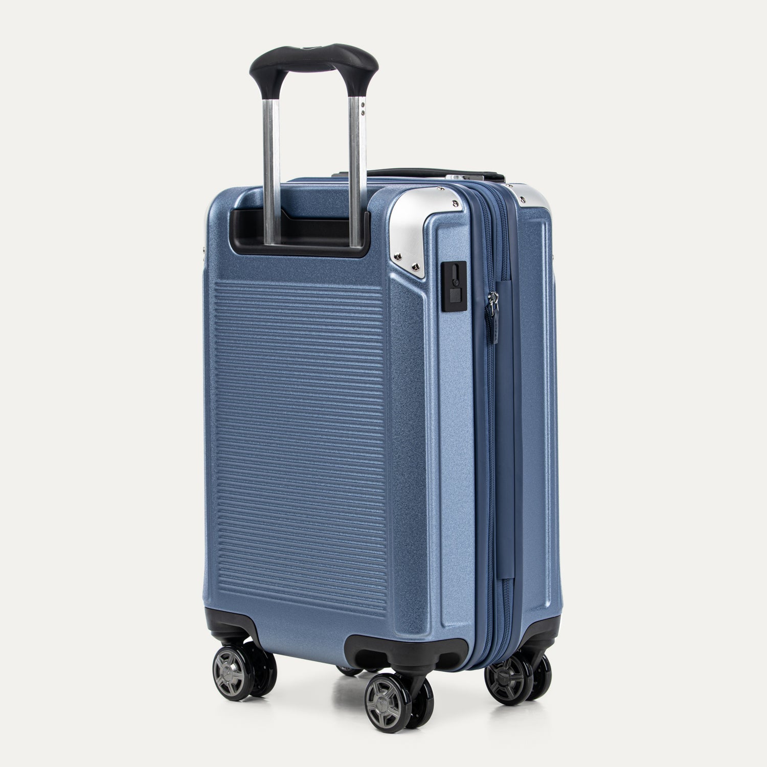 Blue suitcase with a textured surface on a white background