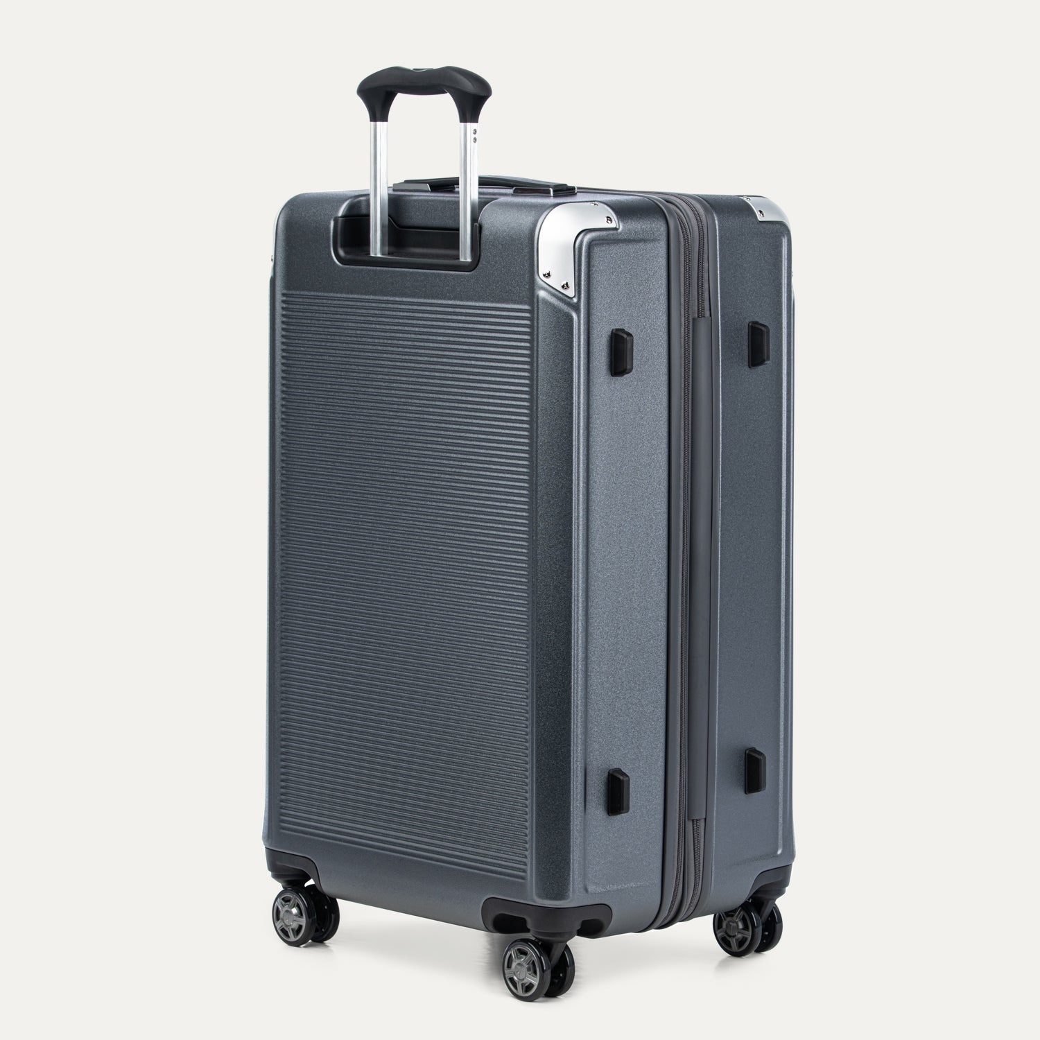 Gray suitcase with handle and wheels on a white background