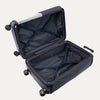 Open navy blue suitcase on a white background
