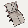 Interior view of Travelpro Platinum Elite Hardside Spinner in Daring Red, featuring zippered divider panel and mesh organizational pockets.

