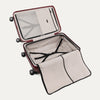 Open suitcase showing spacious interior on a white background.
