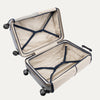 Open suitcase with beige interior and black straps on a white background