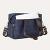 True navy tote with a laptop in the padded sleeve compartment on a white background 
