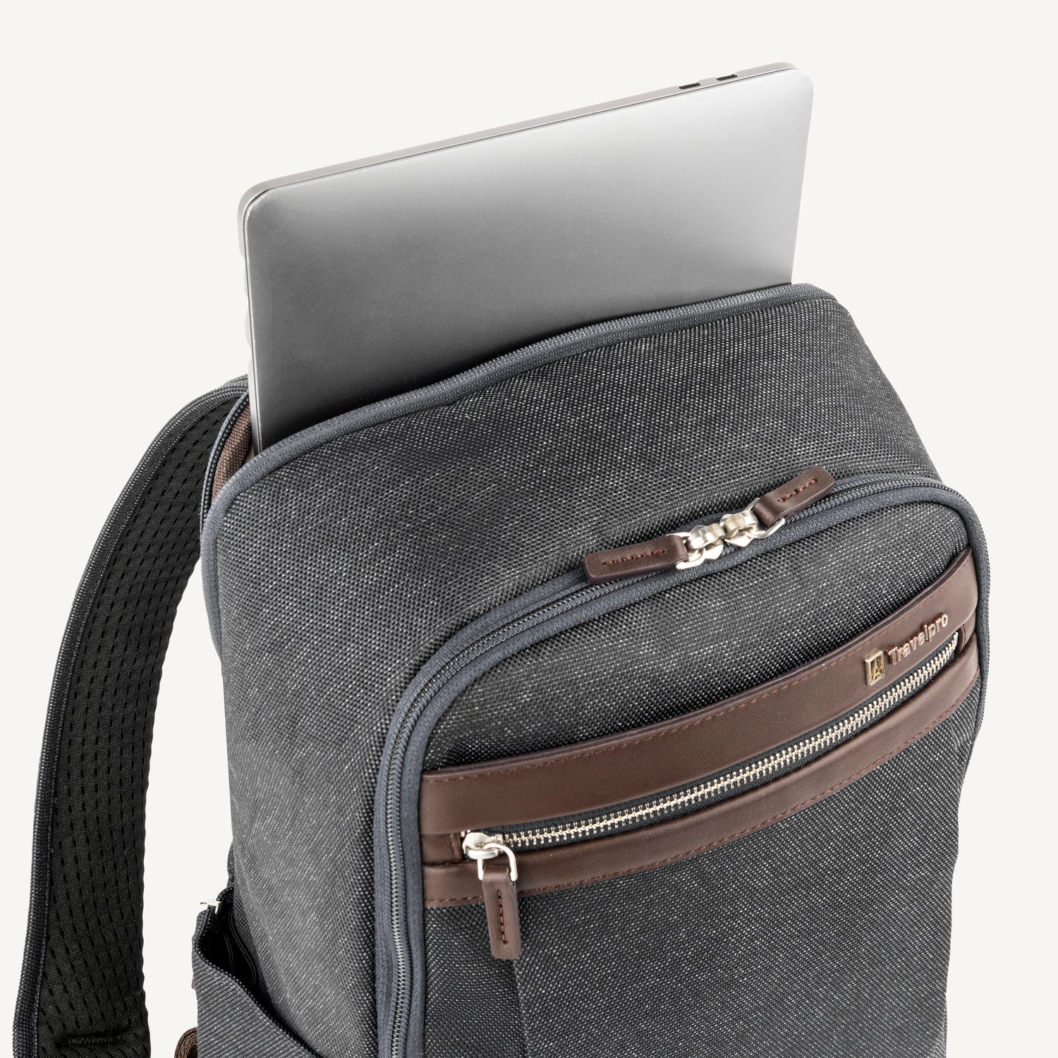Vintage Gray backpack with laptop visibly stored in the dedicated sleeve compartment.

