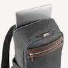 Vintage Gray backpack with laptop visibly stored in the dedicated sleeve compartment.
