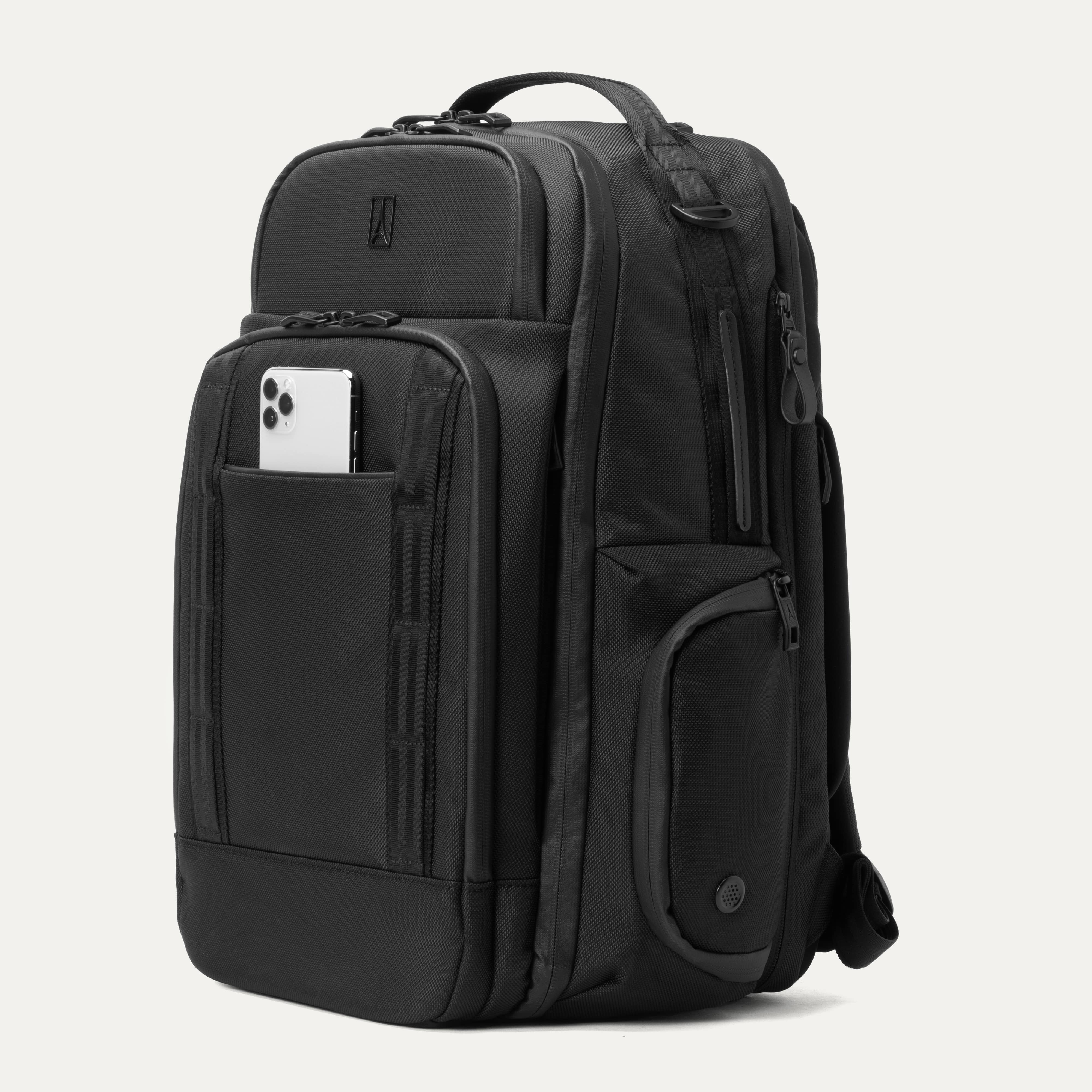 Black backpack with a pocket holding a phone on a white background