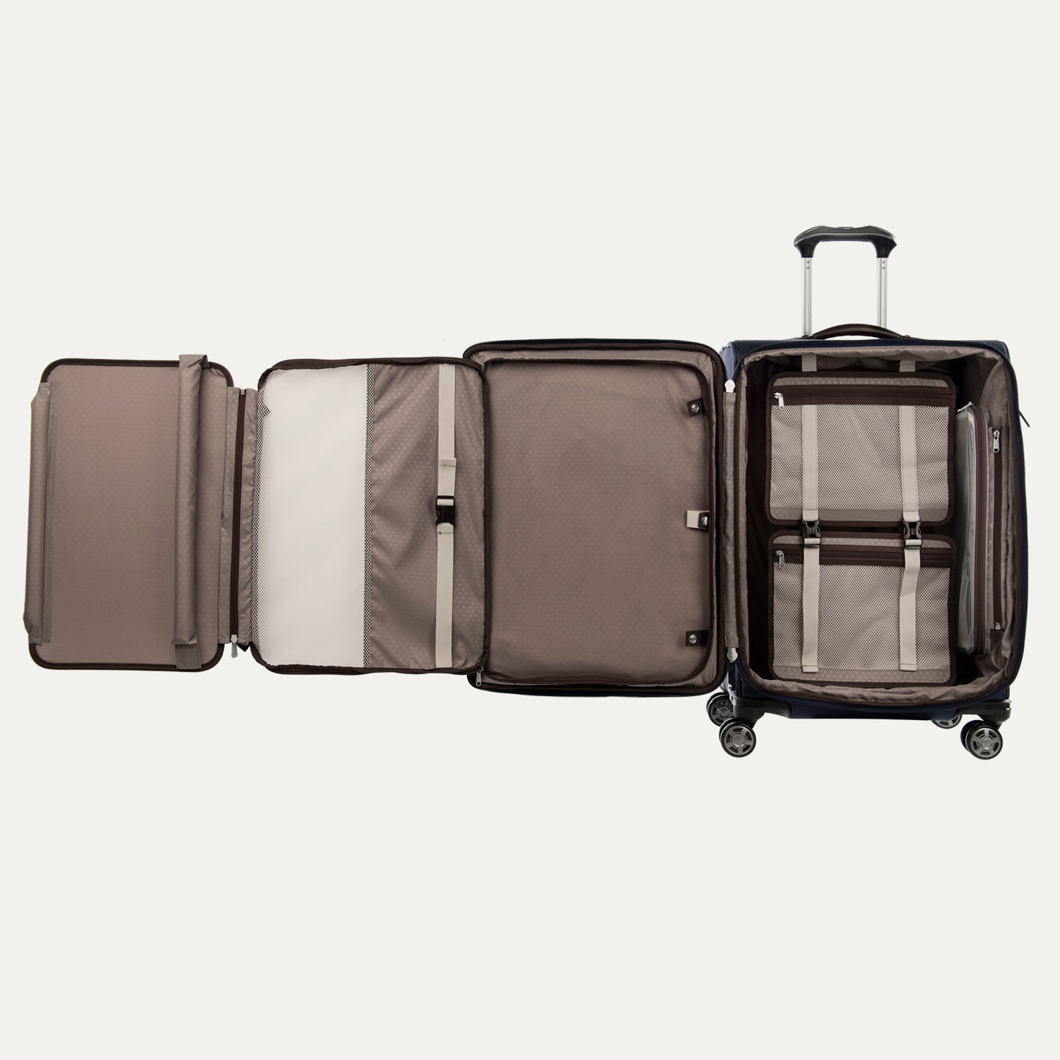 Open suitcase with interior compartments on a light gray background