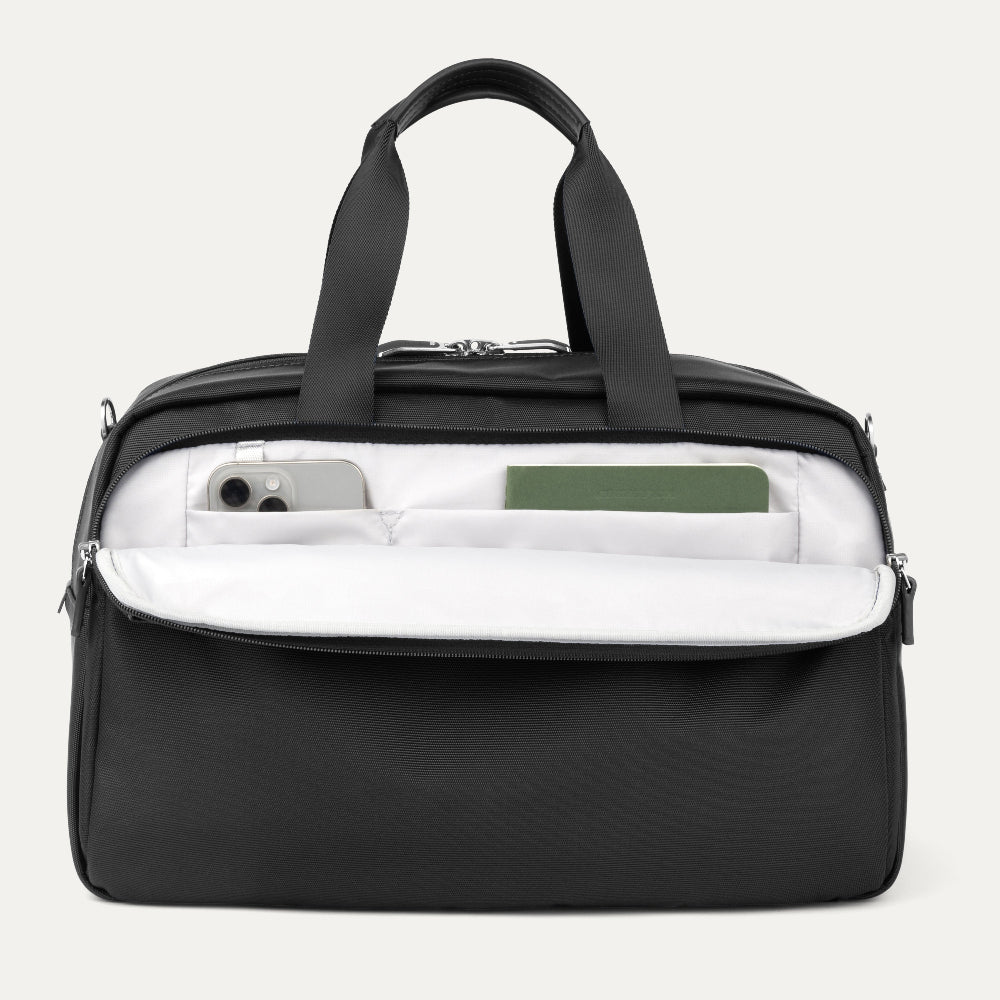pocket details of a black carry on tote bag