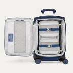 Blue suitcase with open compartment showing organized packing