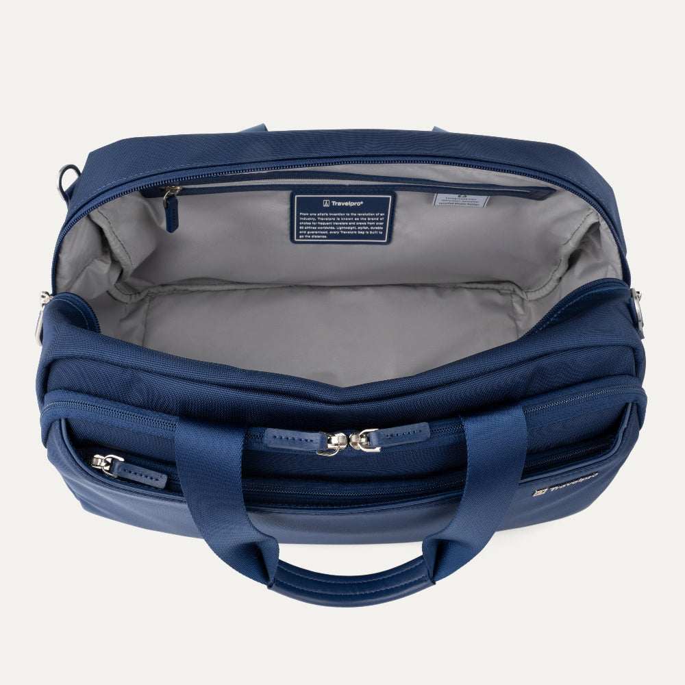 Blue tote bag with open lid on a light gray background