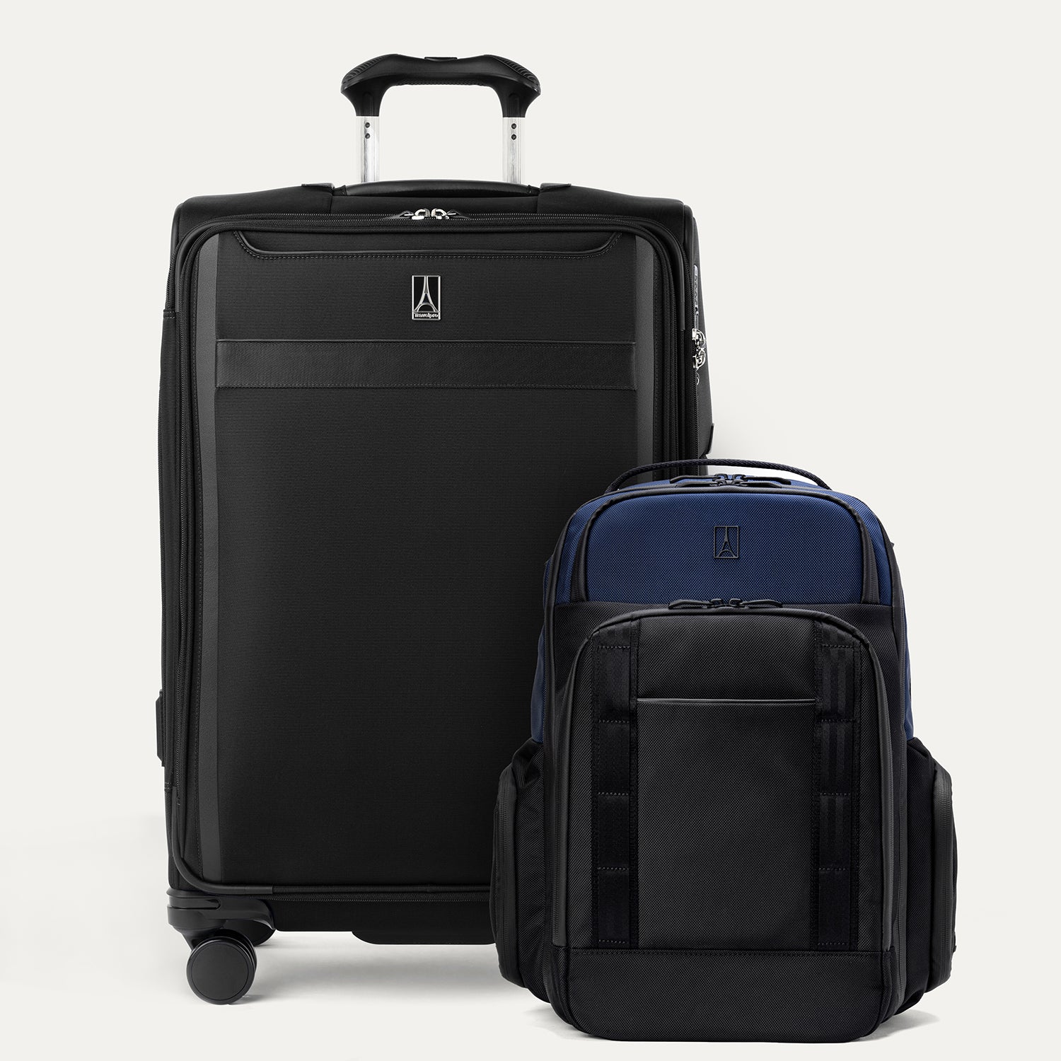 A set of two pieces of luggage, a larger check-in spinner suitcase in black and a  expandable laptop backpack in aviator navy
