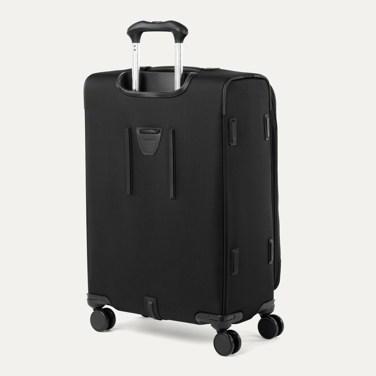 Black suitcase with wheels and handle on a white background