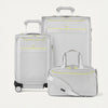 Set of gray suitcases with yellow accents on a white background