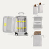 Set of travel packing cubes, shoebags and a suitcase with yellow straps on a white background