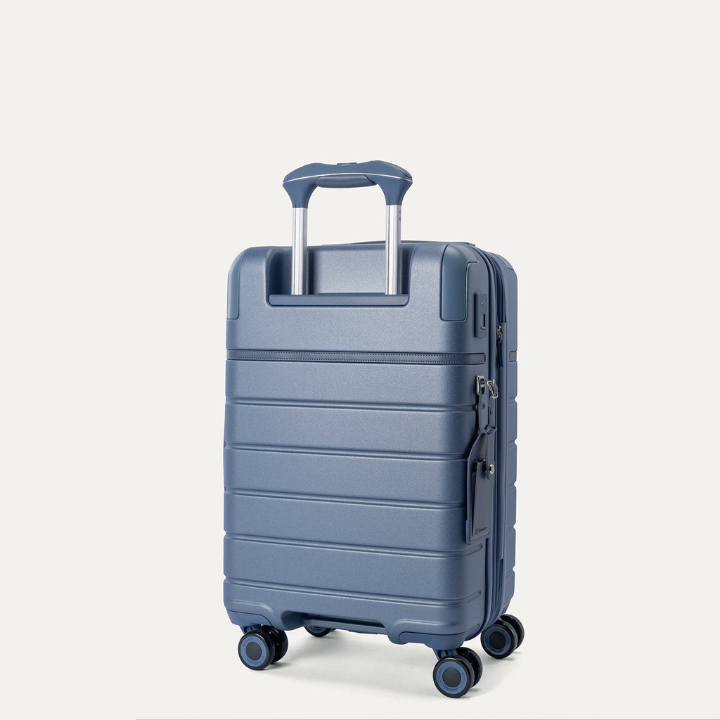 Rear angled view of the Compact Carry-On from the Travelpro Platinum Reserve Compact Carry-On / Large Check-In Hardside Set in Steel Blue