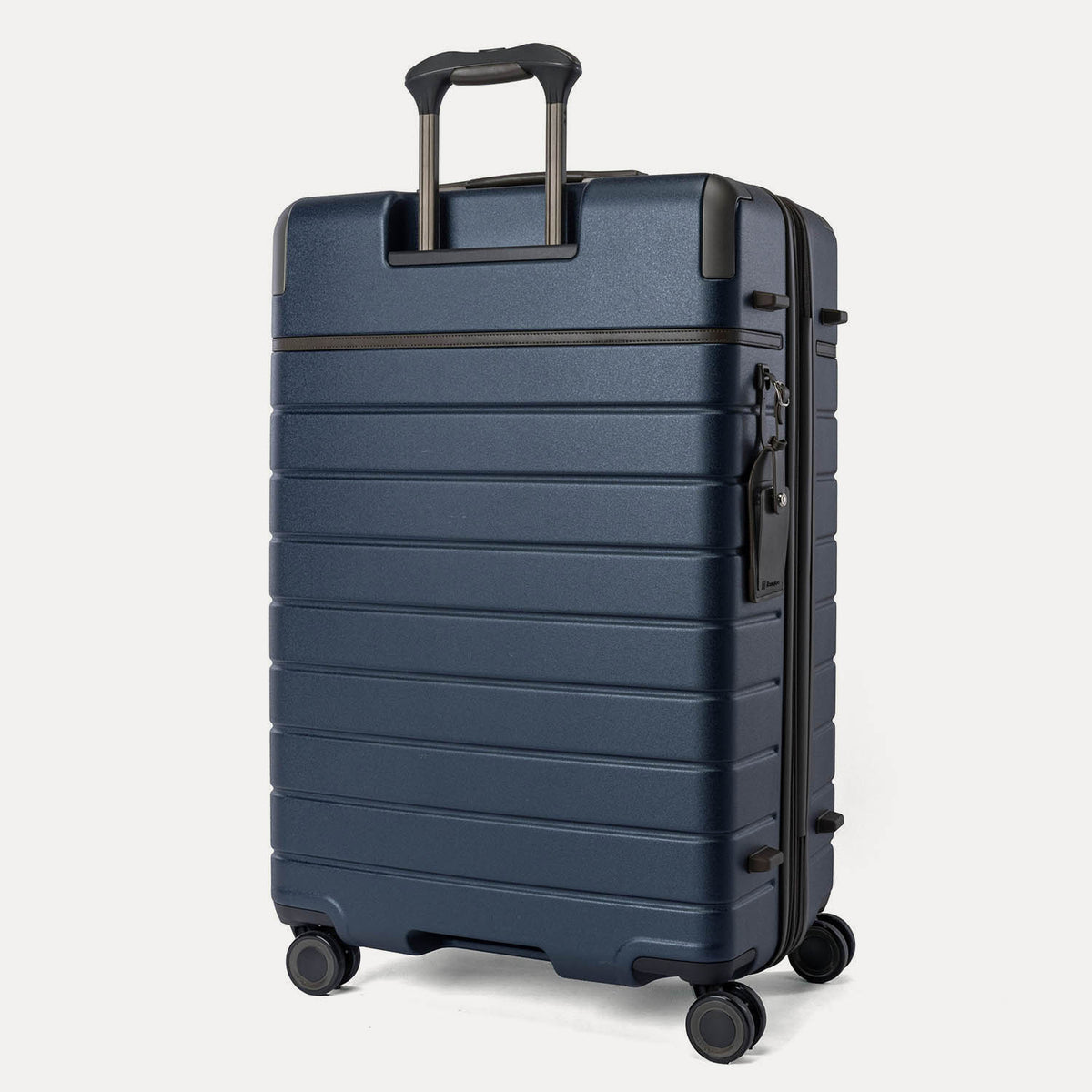 Rear angled view of the Large Check-In from the Travelpro Platinum Reserve Compact Carry-On / Large Check-In Hardside Set in Midnight Trail