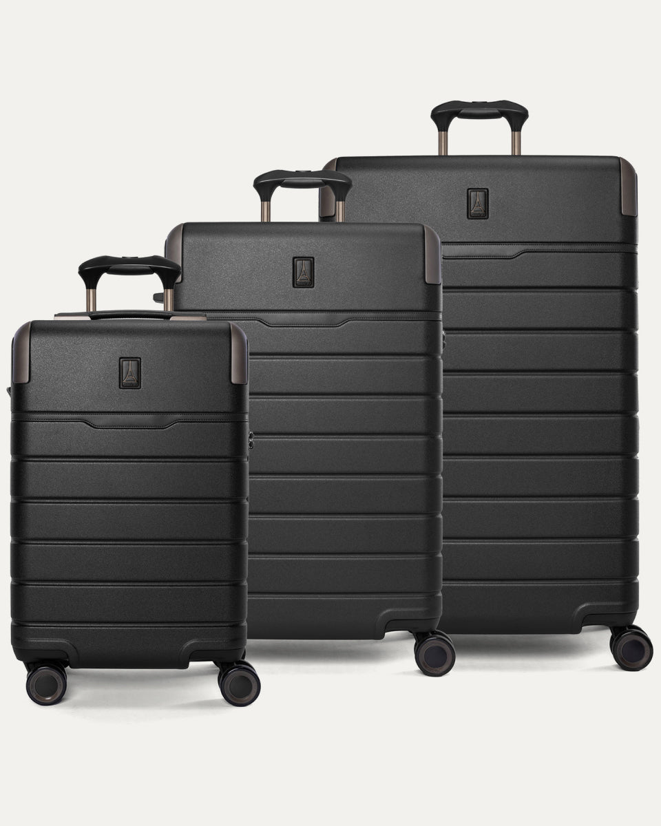 Travelpro Platinum Reserve Carry-On / Medium / Large Hardside Set in Black Dust, all three pieces shown together