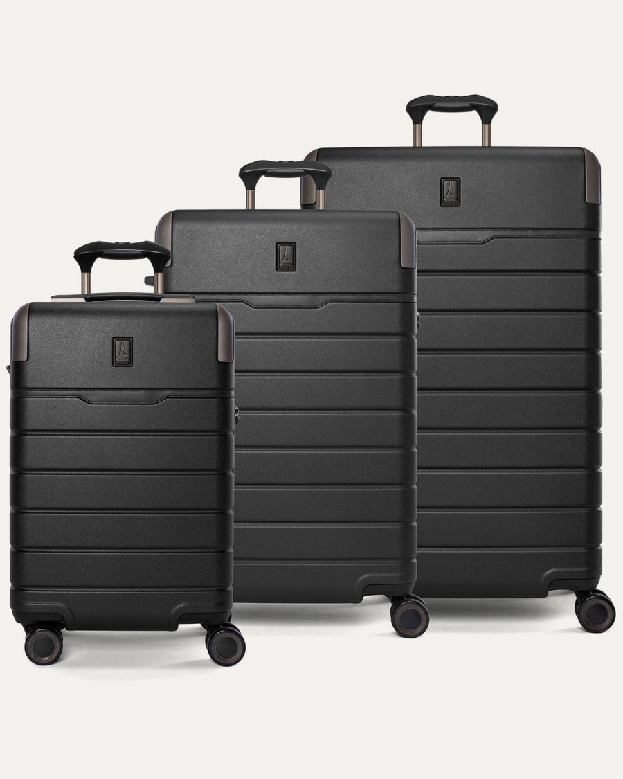 Travelpro Platinum Reserve Carry-On / Medium / Large Hardside Set in Black Dust, all three pieces shown together