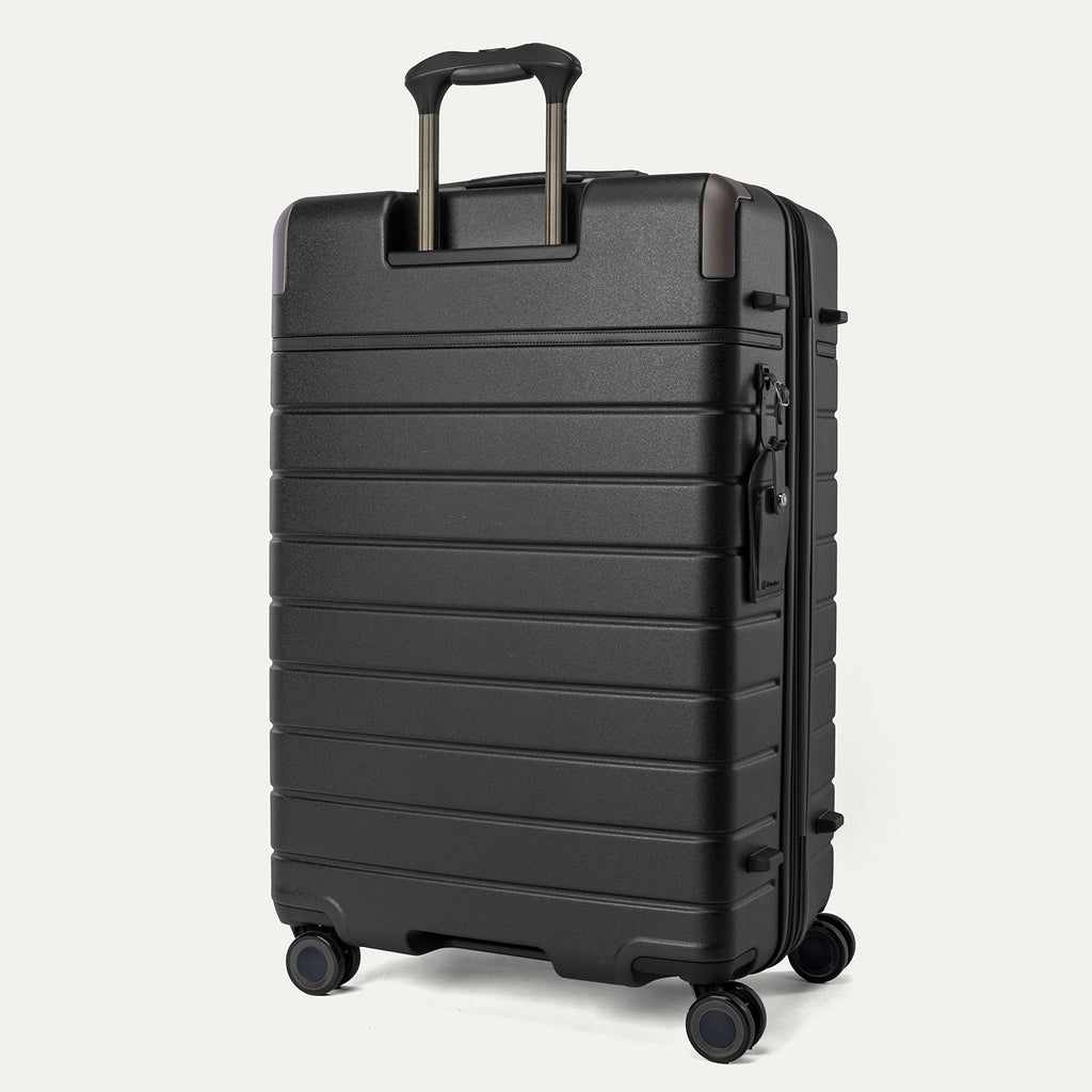 Rear angled view of the Large Check-In from the Travelpro Platinum Reserve Carry-On / Medium / Large Hardside Set in Black Dust