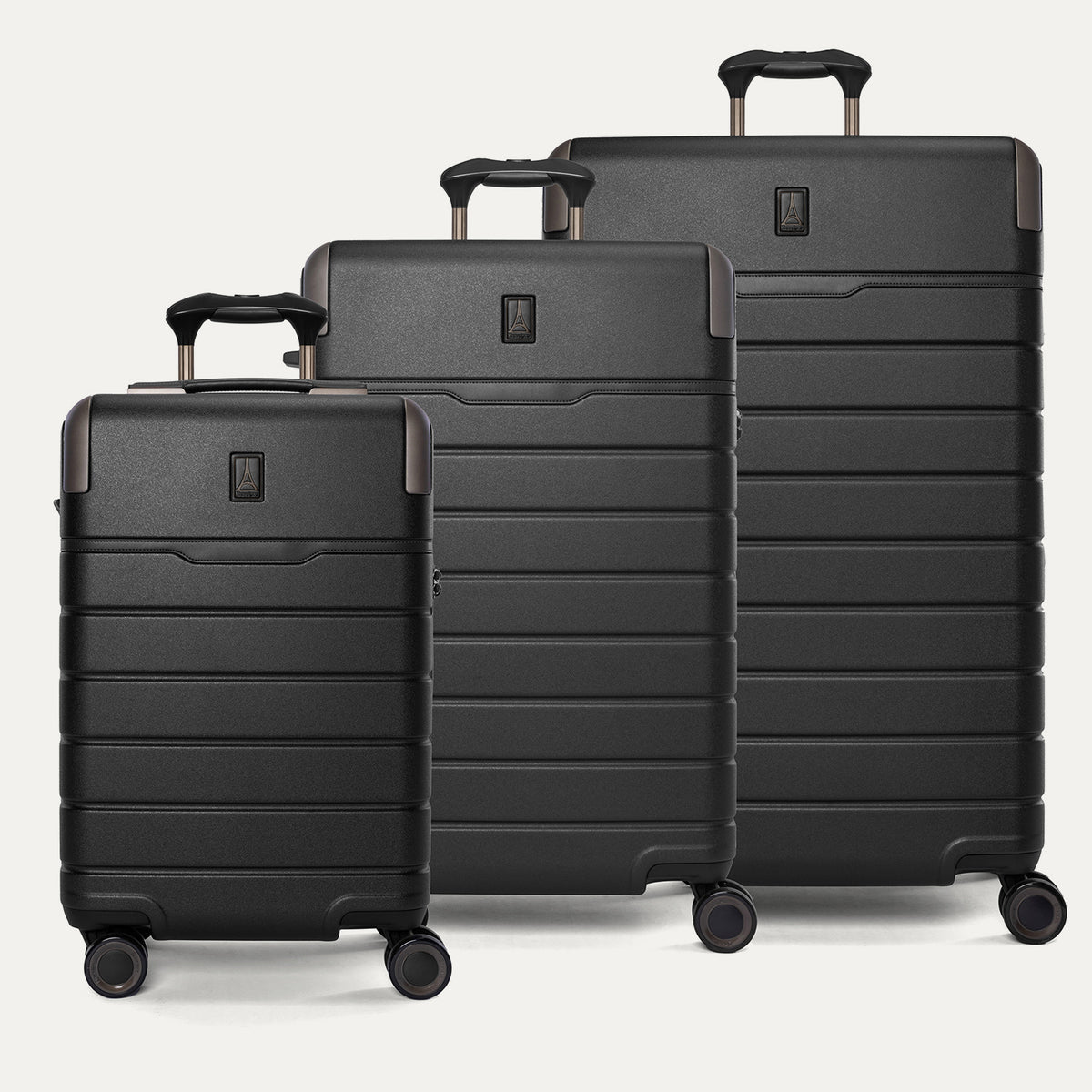 Travelpro Platinum Reserve Carry-On / Medium / Large Hardside Set in Black Dust, all three pieces shown together