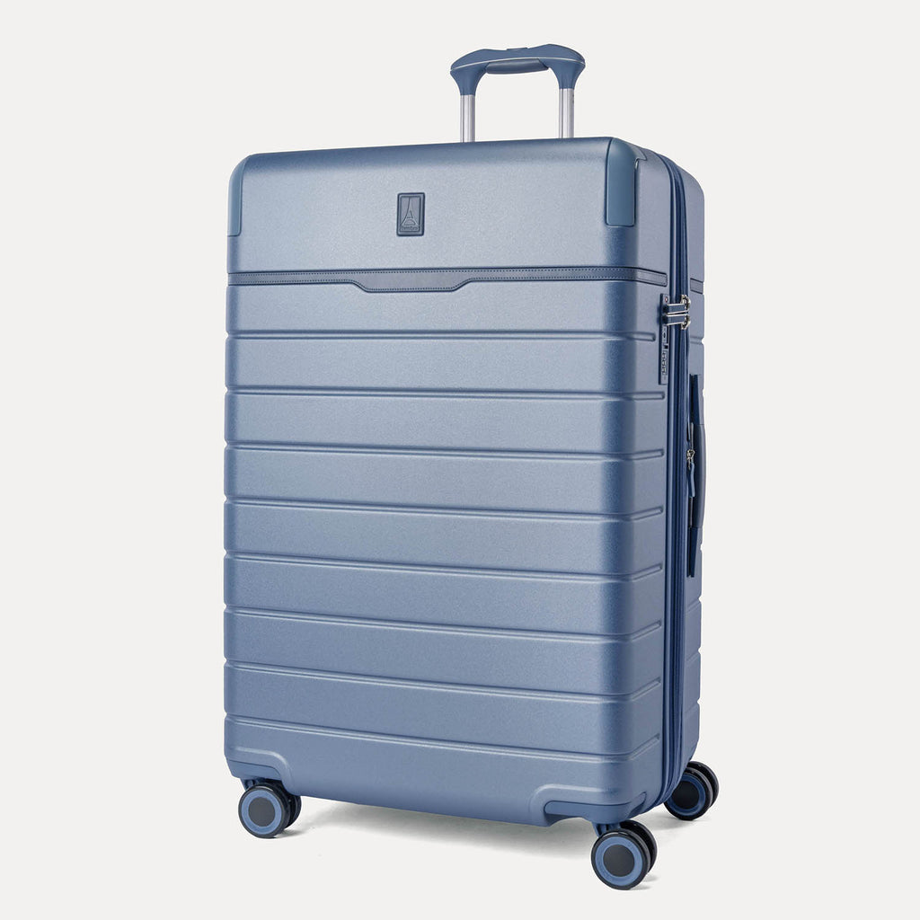 Three-quarter front view of the Large Check-In from the Travelpro Platinum Reserve Carry-On / Large Check-In Hardside Set in Steel Blue