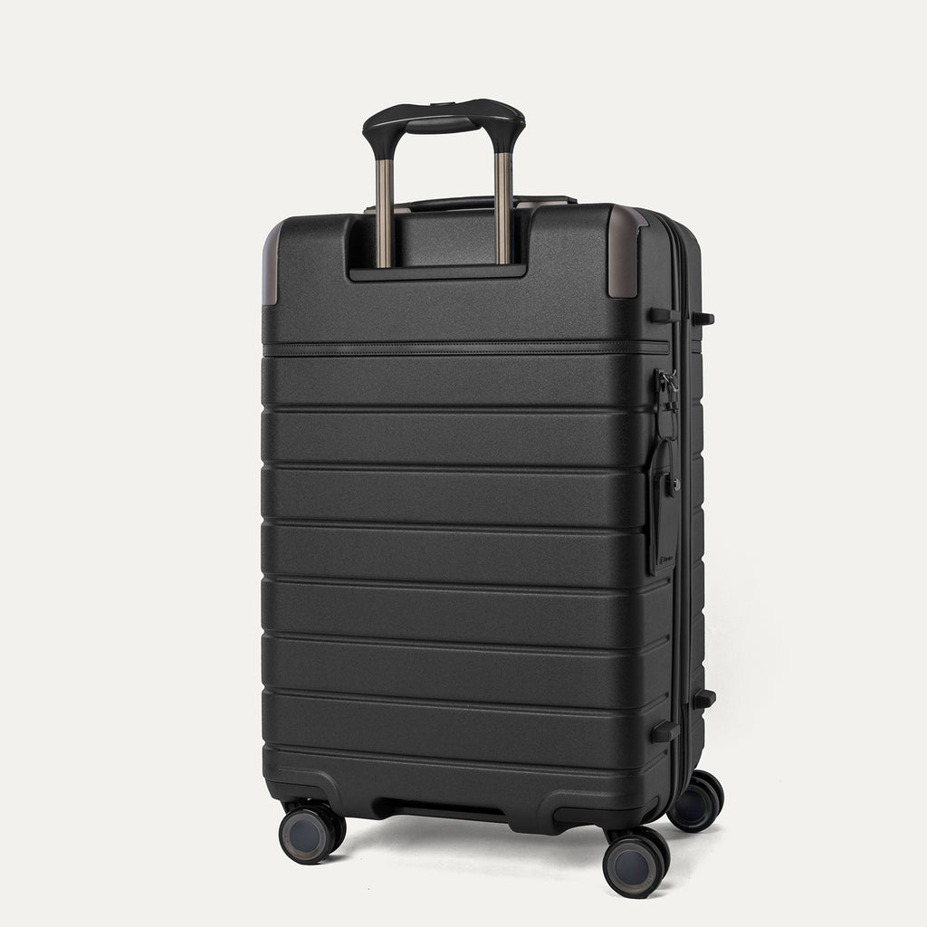 Rear angled view of the Medium Check-In from the Travelpro Platinum Reserve Medium / Large Check-In Hardside Set in Black Dust
