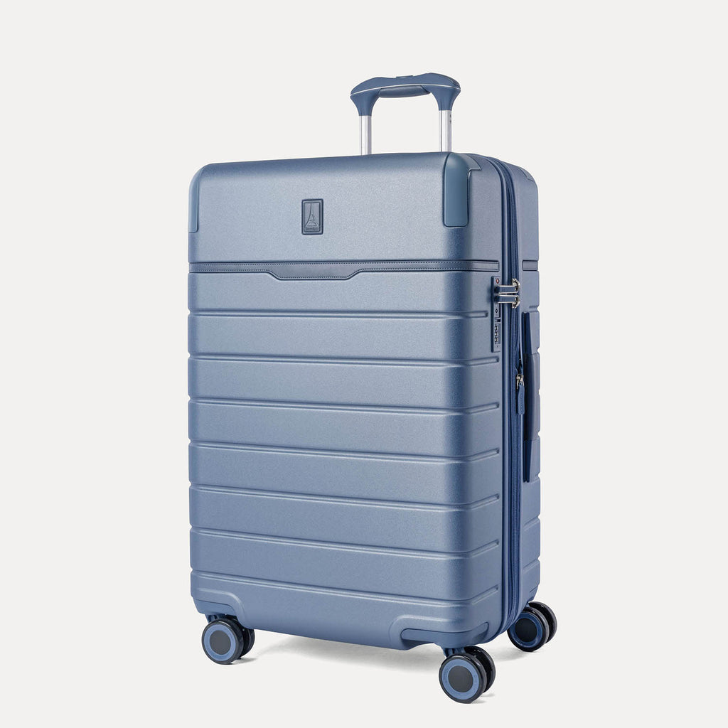 Three-quarter front view of the Medium Check-In from the Travelpro Platinum Reserve Medium / Large Check-In Hardside Set in Steel Blue
