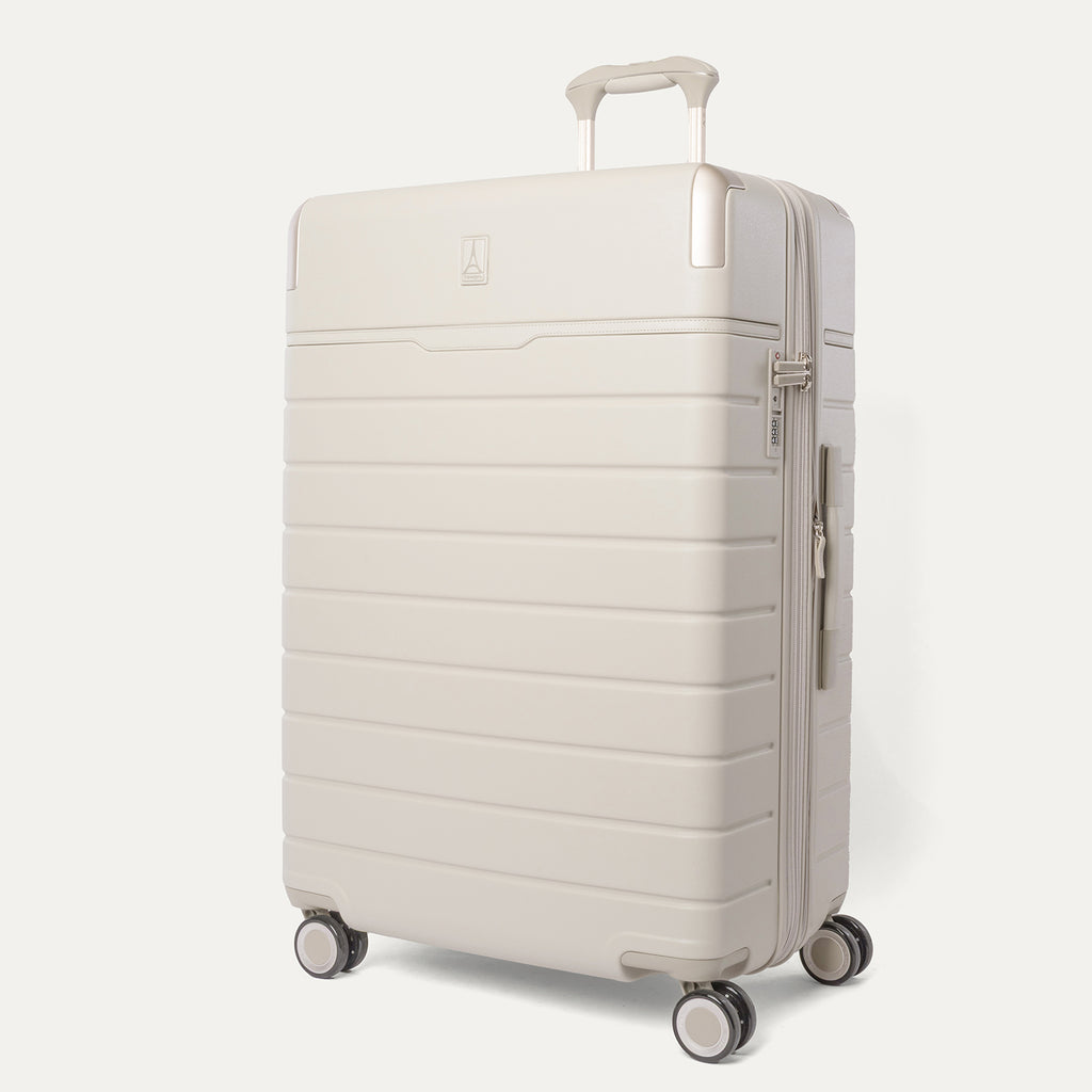 Three-quarter front view of the Large Check-In from the Travelpro Platinum Reserve Medium / Large Check-In Hardside Set in Sandstone