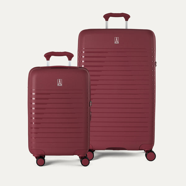 Side-by-side view of the Optima Expandable Compact Carry-On and Large Check-In suitcases in Tibetan Red, displayed on a light gray background to highlight the size difference between the two pieces.
