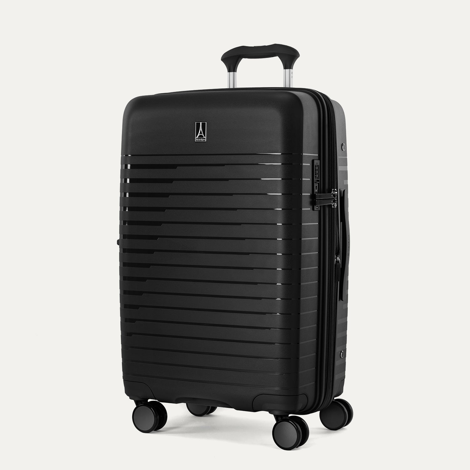 Three-quarter view of the Optima Expandable Medium Check-In hardside spinner in Black, showcasing the durable textured exterior, telescoping handle, and multi-directional spinner wheels.