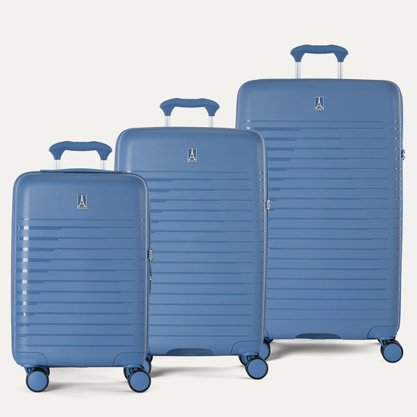 Side-by-side view of the Optima Expandable Carry-On, Medium, and Large Check-In suitcases in Horizon Blue, displayed on a light background to highlight the size difference across the three-piece set.