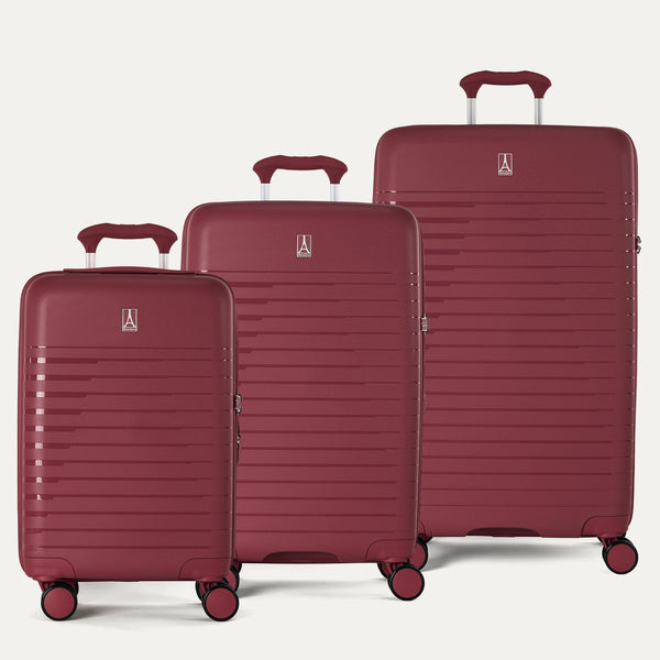 Side-by-side view of the Optima Expandable Carry-On, Medium, and Large Check-In suitcases in Tibetan Red, displayed on a light background to highlight the size difference across the three-piece set.