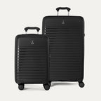 Side-by-side view of the Optima Expandable Carry-On and Large Check-In suitcases in Black, displayed on a neutral background to highlight the size difference across the two-piece set.