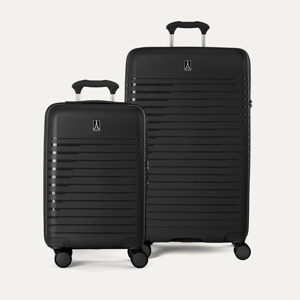 Side-by-side view of the Optima Expandable Carry-On and Large Check-In suitcases in Black, displayed on a neutral background to highlight the size difference across the two-piece set.