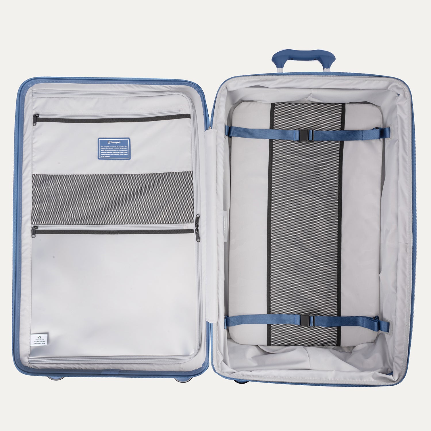Interior view of the open Optima Expandable Large Check-In suitcase in Horizon Blue, showcasing the spacious split-case design with zippered mesh divider panels, compression straps, and interior accessory pockets.