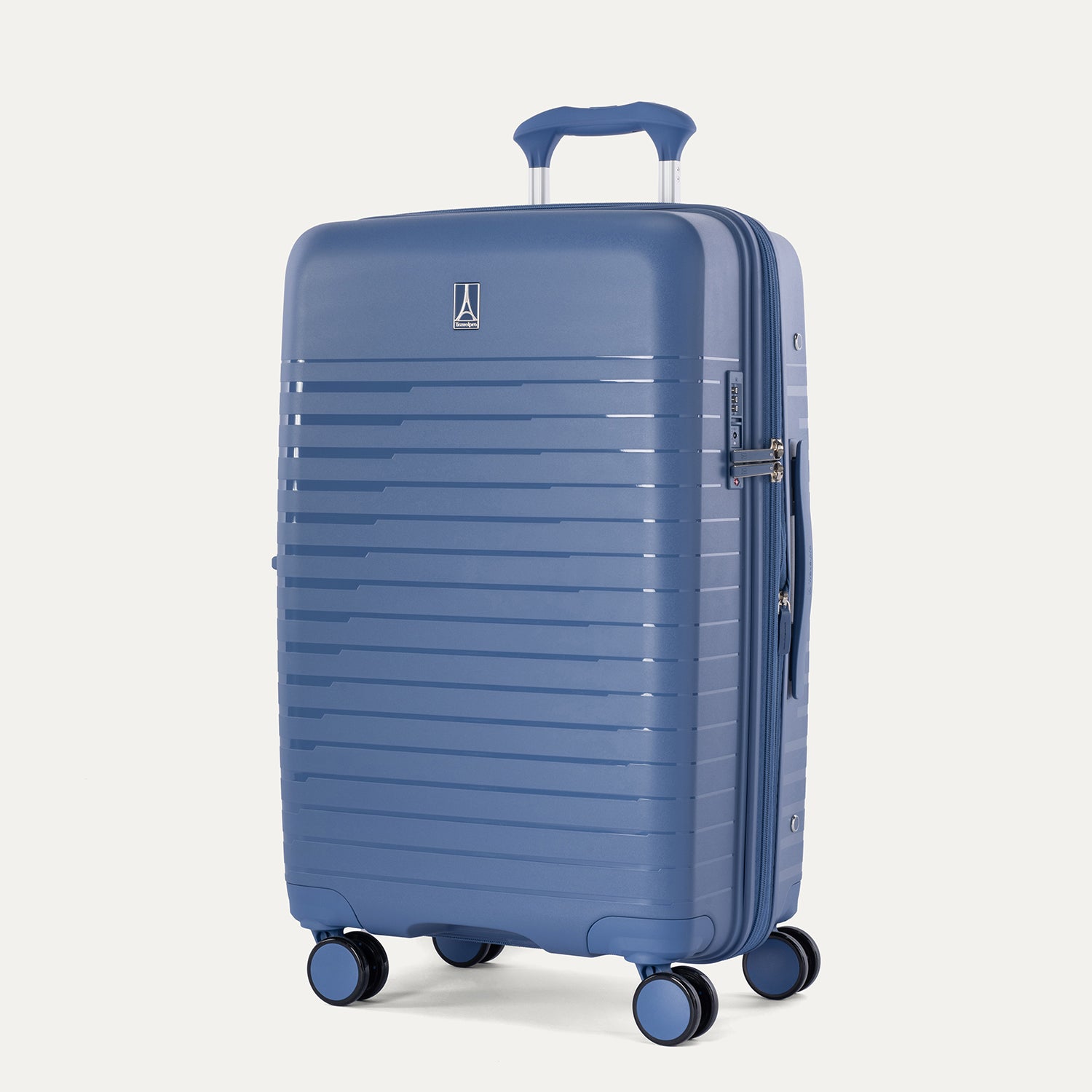 Three-quarter view of the Optima Expandable Compact Carry-On hardside spinner in Horizon Blue, showcasing the textured exterior, telescoping handle, and multi-directional spinner wheels.