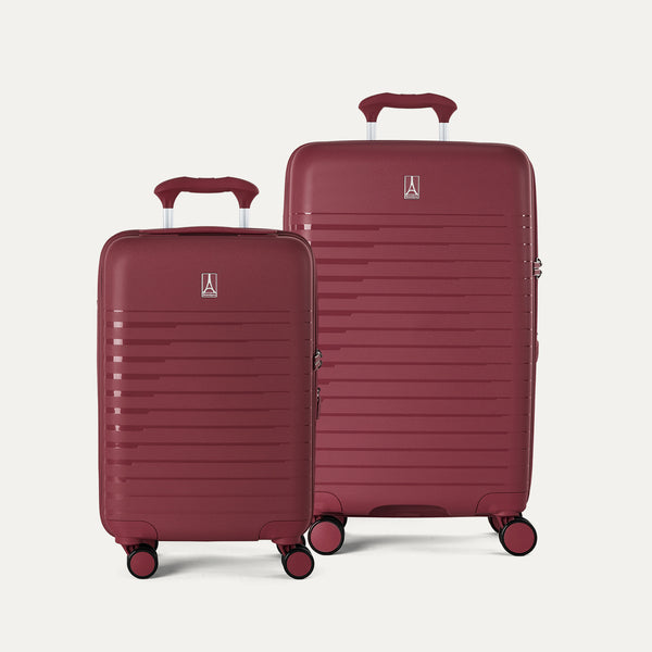 Two suitcases from the Optima Expandable Compact Carry-On and Medium Check-In set in Tibetan Red, displayed side-by-side on a light gray background to show the size difference.