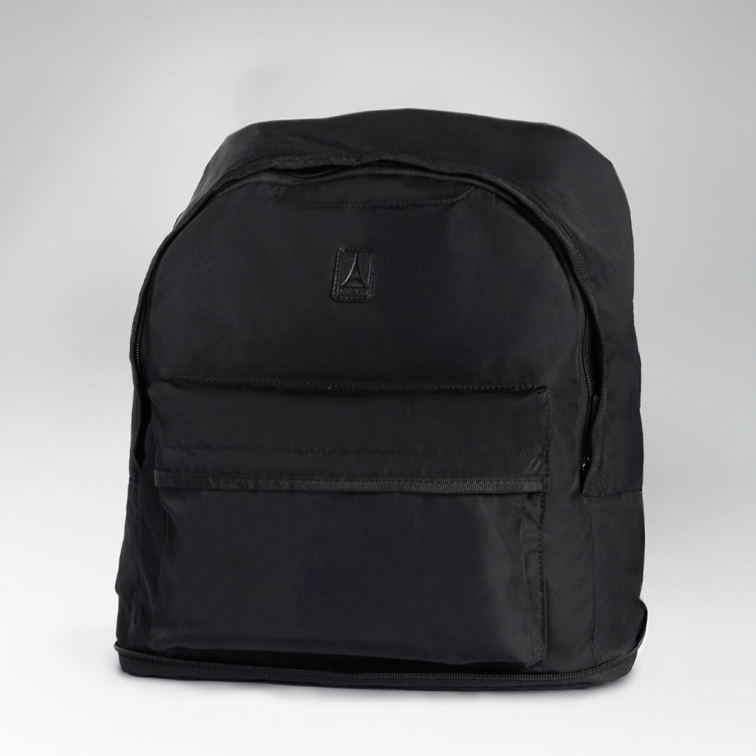 Black backpack on a light gray background