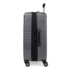 Side profile view of the Travelpro Roundtrip Hardshell Medium Check-In Suitcase in Gunmetal Gray, showing textured hardshell design, expansion zipper open, black telescoping handle, and four spinner wheels against white background.