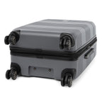 Three-quarter bottom view of the Travelpro Roundtrip Medium Check-In Expandable Spinner in Gunmetal Gray, showing the textured hardshell design, four multi-directional wheels, and the expansion zipper against a clean white background.